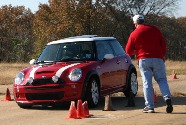 Instructor signaling when to make hard turn (rear driver side wheel off ground!)